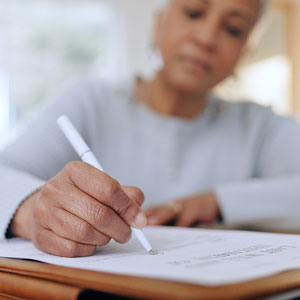 photo of a lady making plans for her funeral